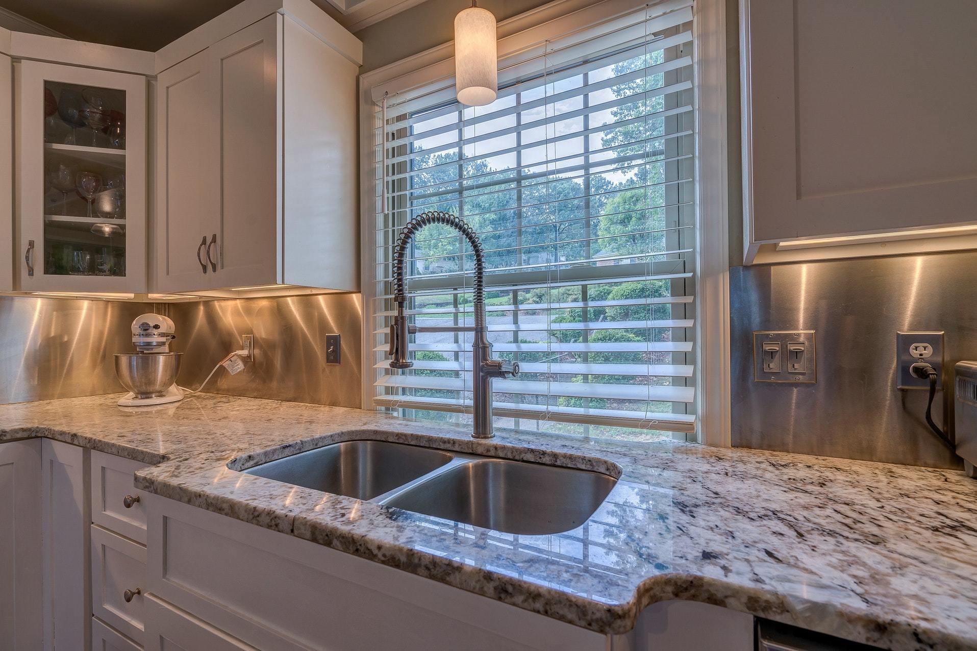 209 Parkcrest Road Southwest Roanoke, VA 24014 - Photo 23 of 48 a kitchen with granite countertop a sink and a refrigerator