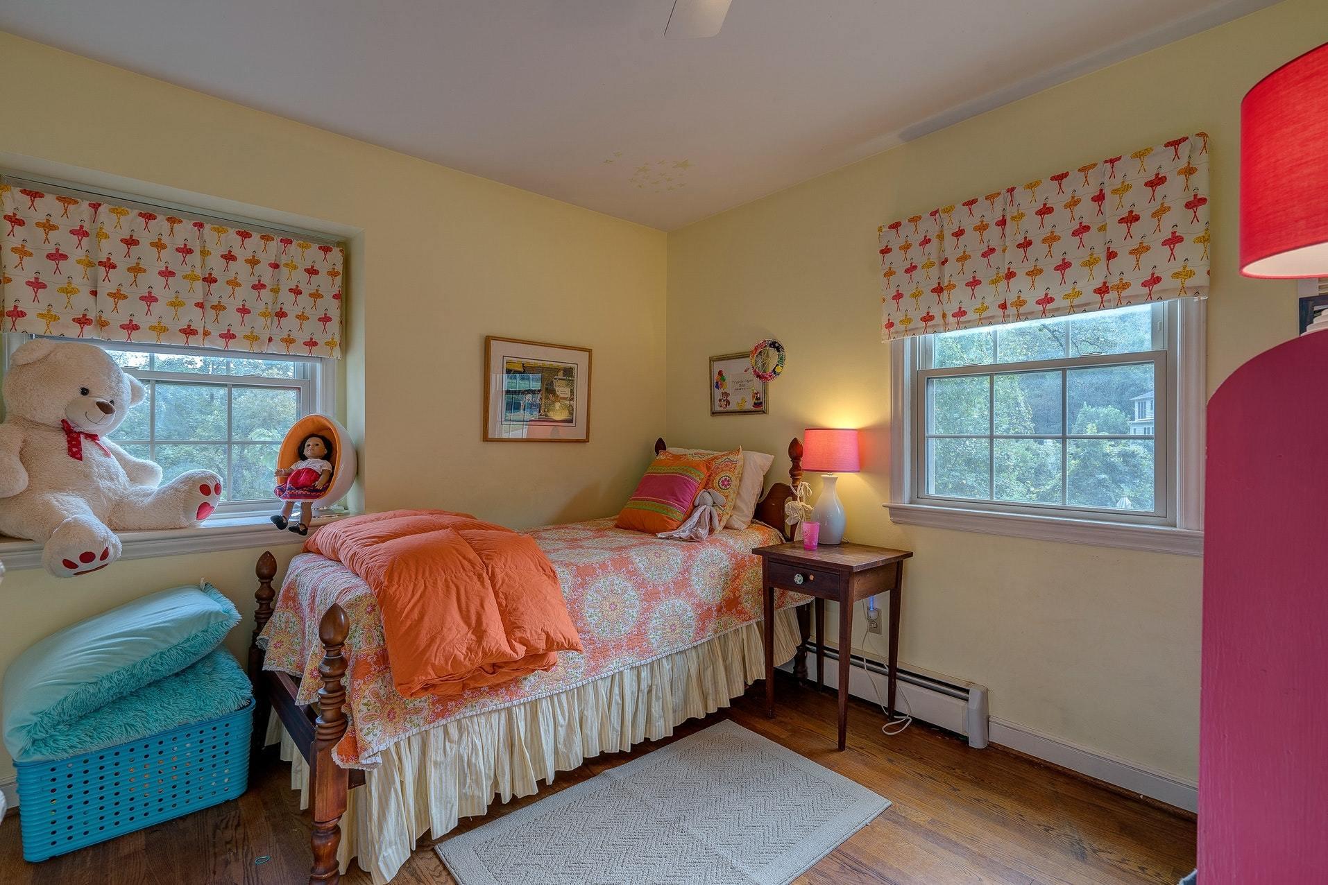 209 Parkcrest Road Southwest Roanoke, VA 24014 - Photo 30 of 48 a bedroom with a bed and a window