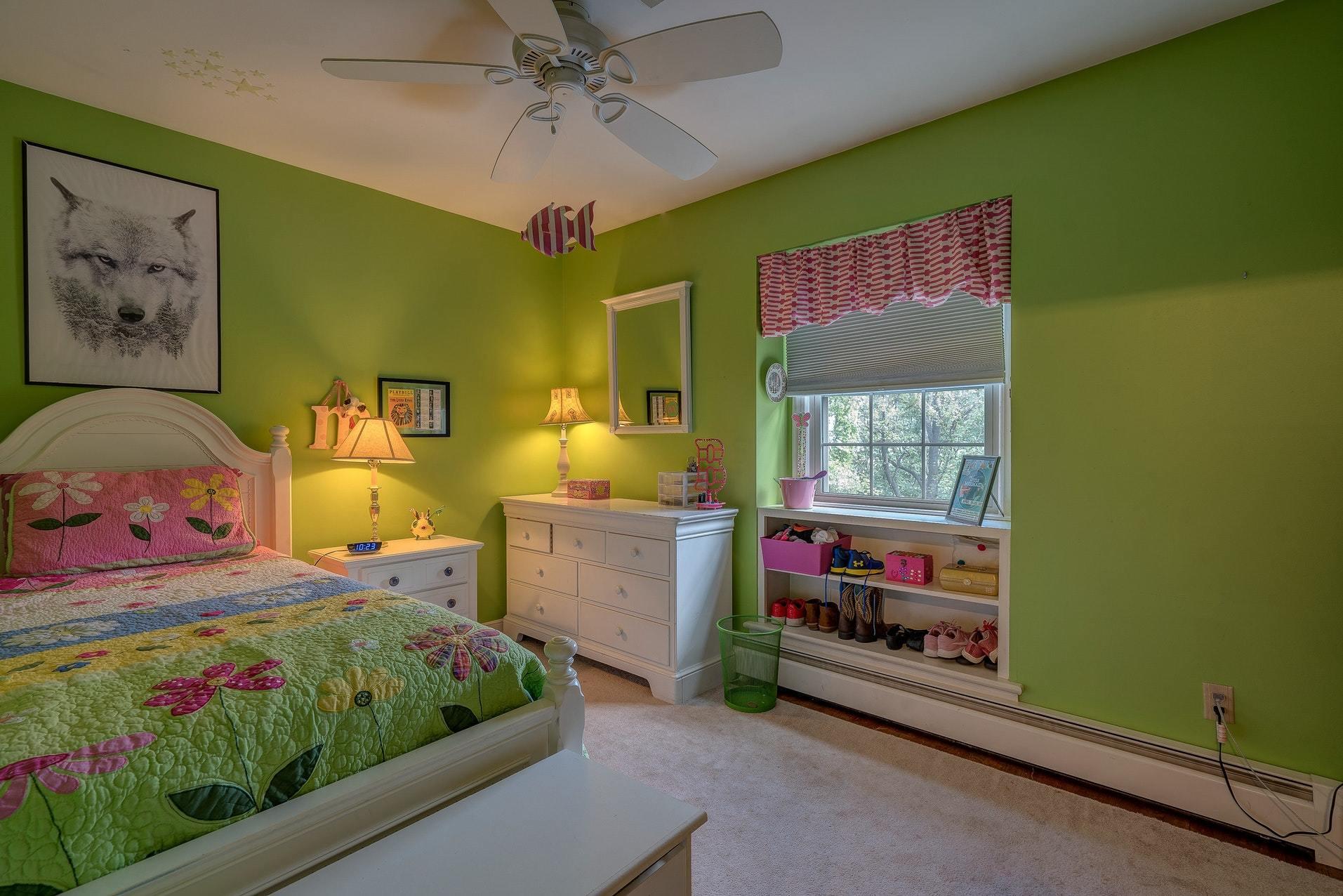 209 Parkcrest Road Southwest Roanoke, VA 24014 - Photo 32 of 48 a bedroom with a bed a window and a chandelier