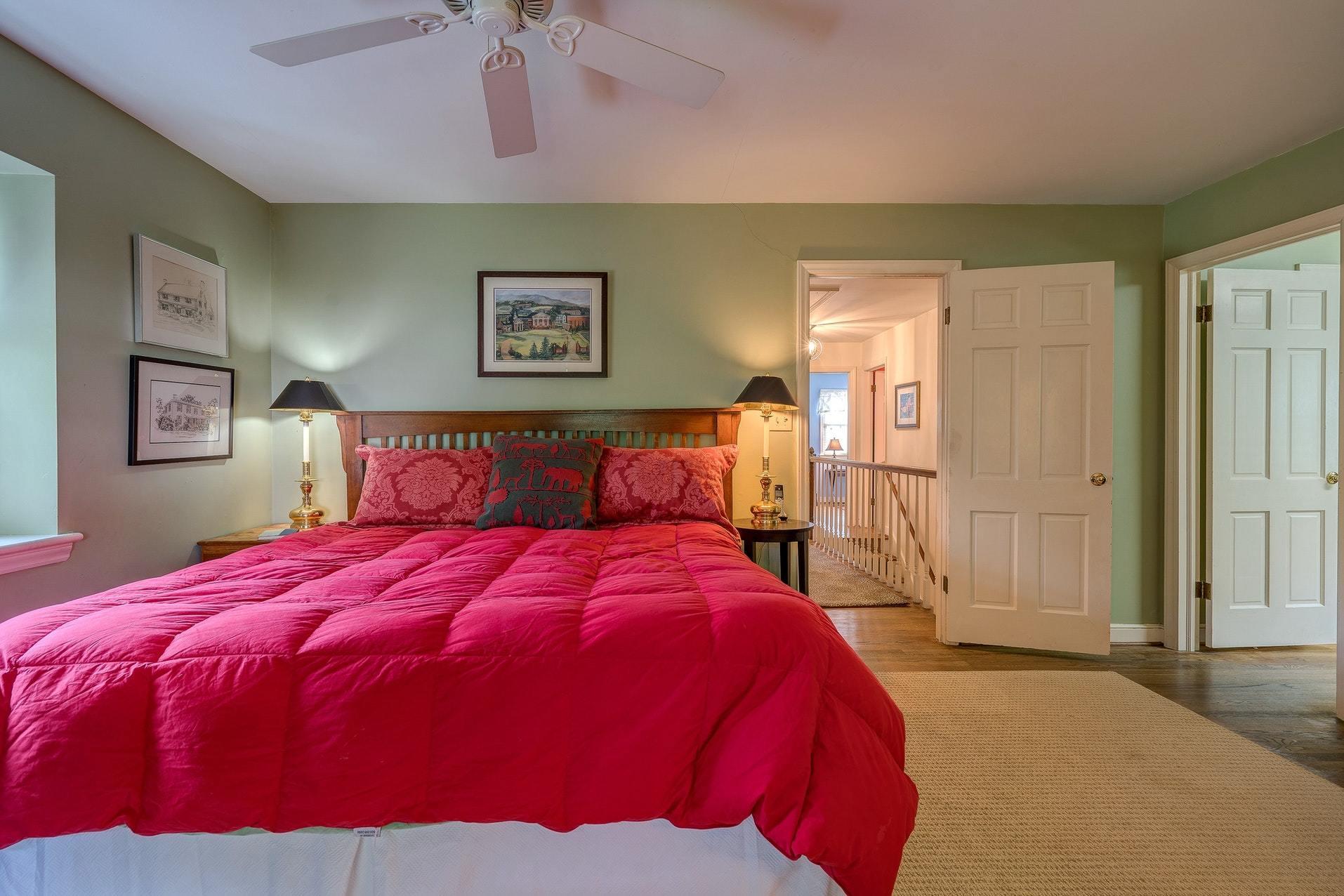 209 Parkcrest Road Southwest Roanoke, VA 24014 - Photo 37 of 48 a bedroom with a bed and painting on the wall
