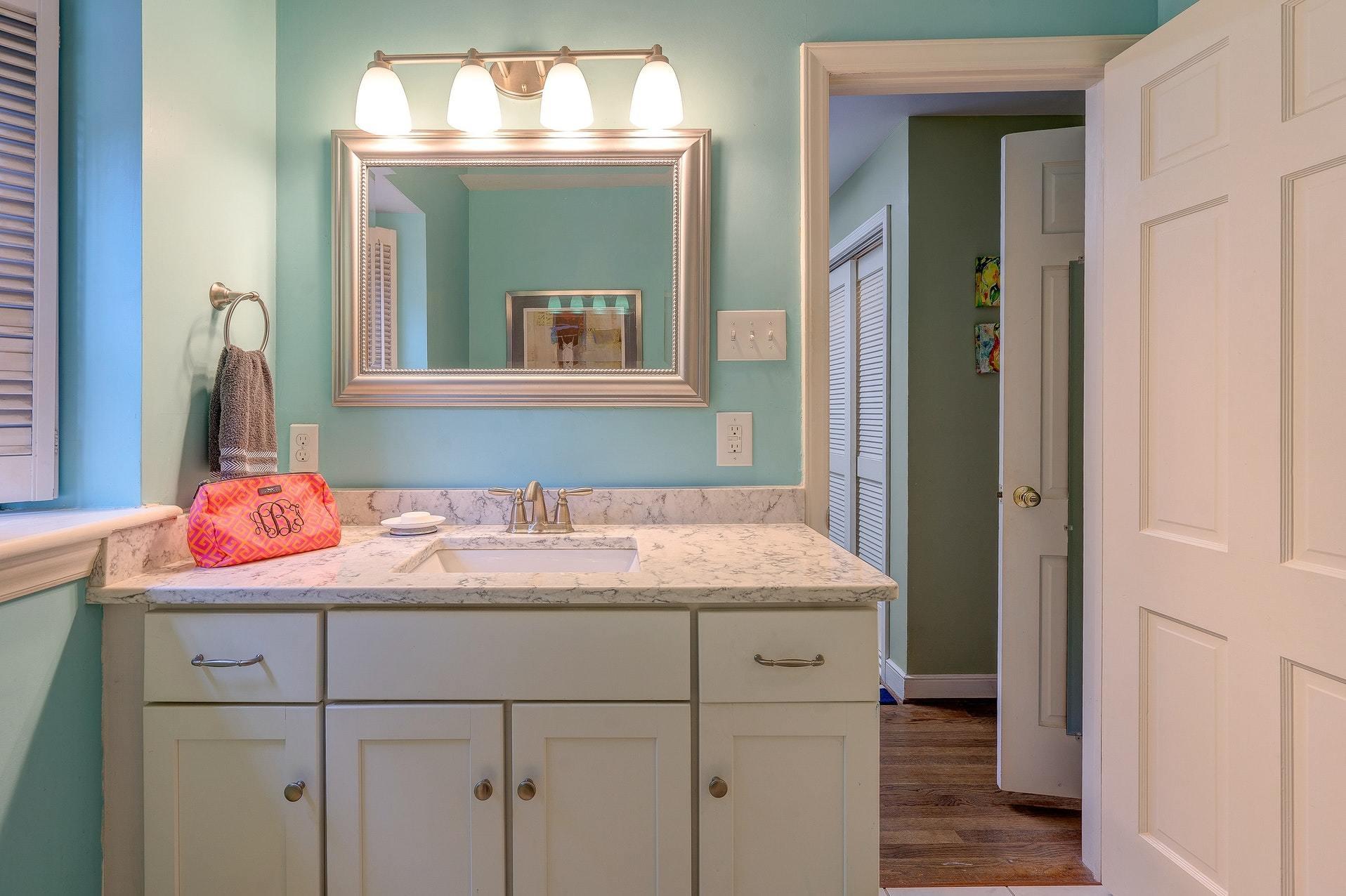 209 Parkcrest Road Southwest Roanoke, VA 24014 - Photo 41 of 48 a bathroom with a sink and a mirror
