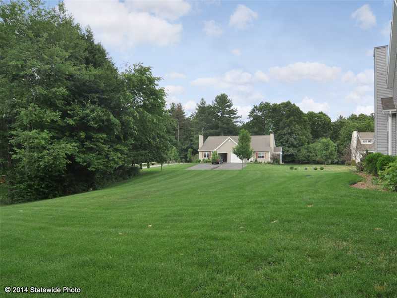 16 Mill Pond Road, Unit 16 Burrillville, RI 02830 - Photo 19 of 25 Yard/Garden. Large side yard is located next to this unit. Plenty of open space to enjoy