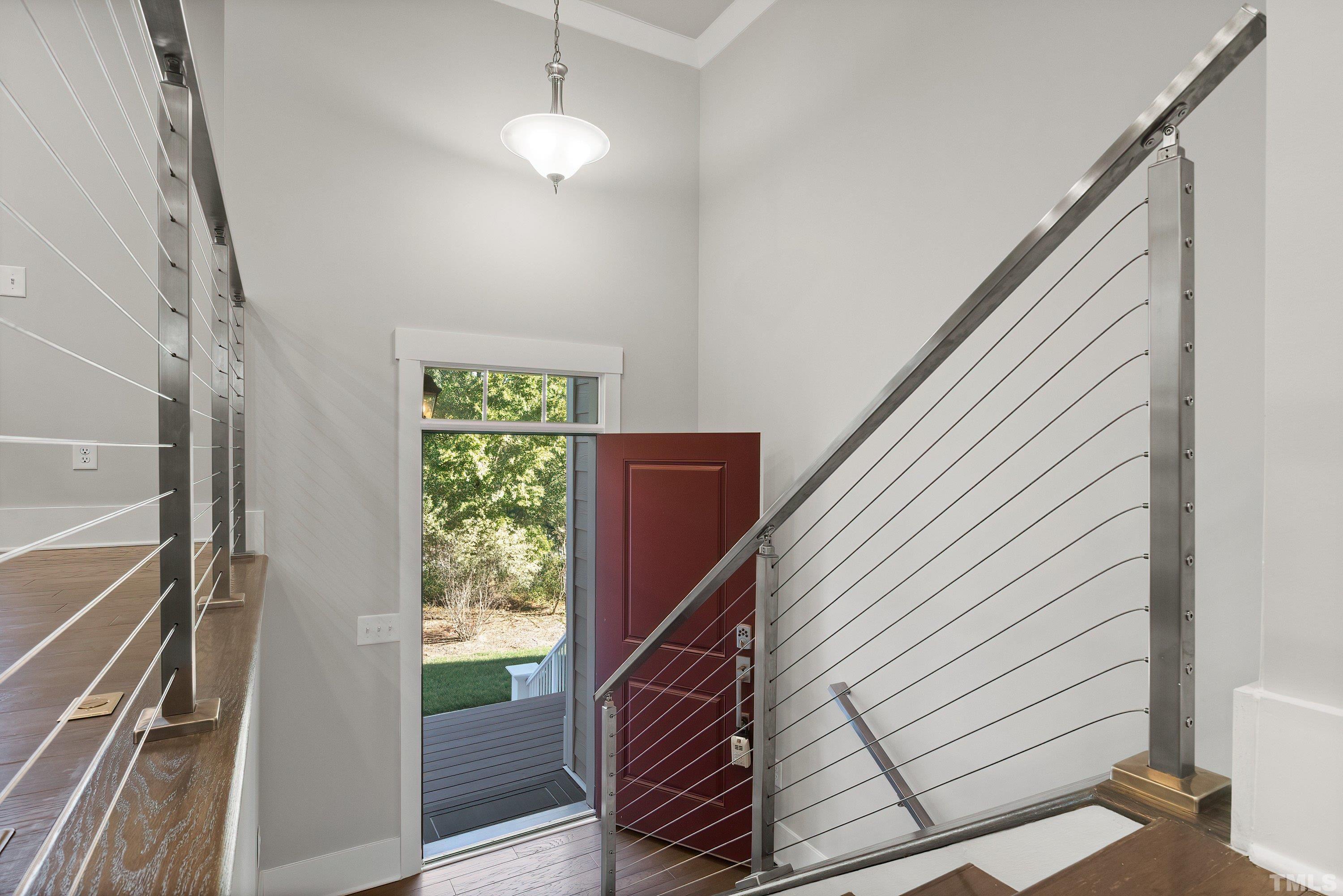 10330 Sablewood Drive, Unit 110 Raleigh, NC 27617 - Photo 4 of 58 a view of entryway and hall with wooden floor