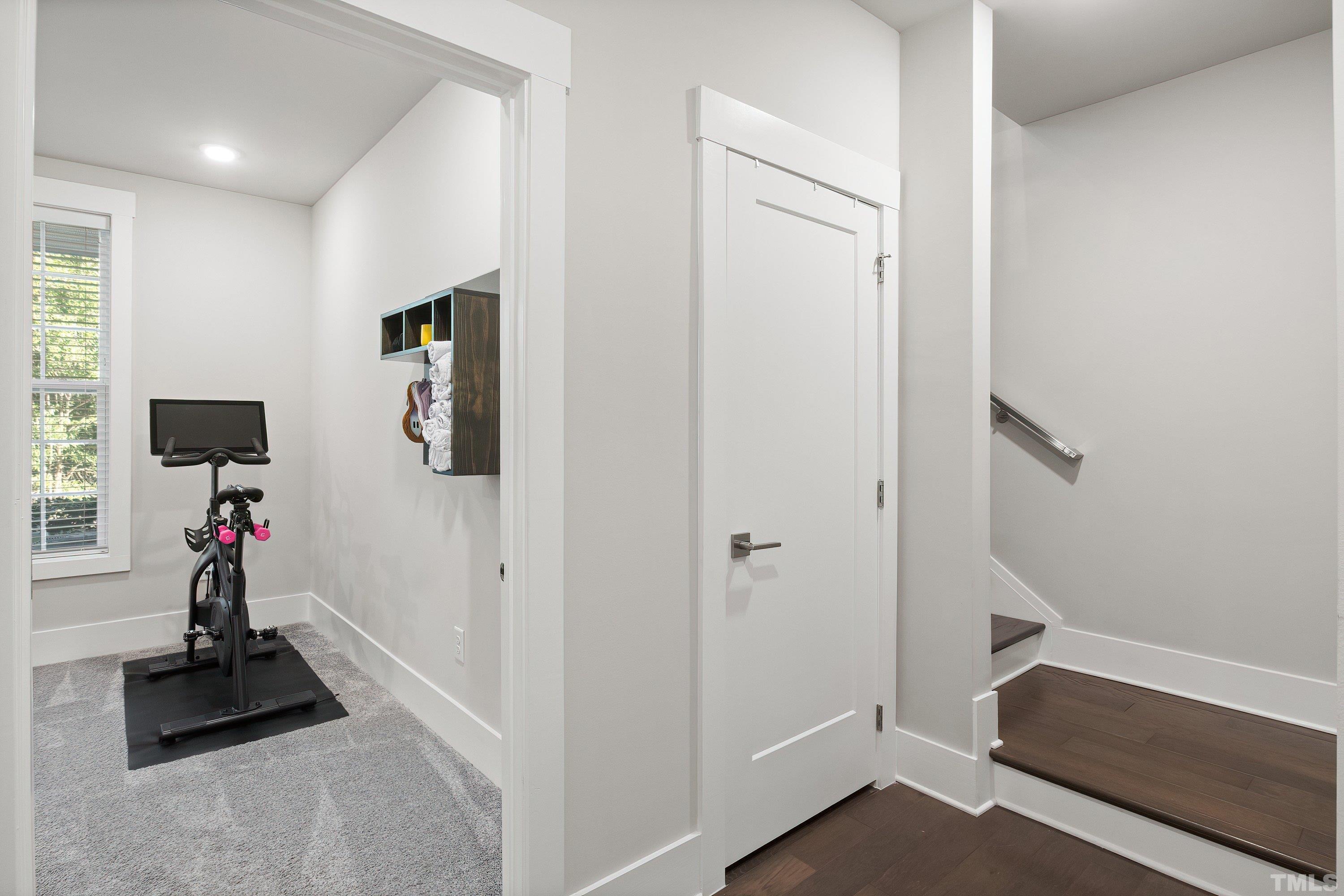 10330 Sablewood Drive, Unit 110 Raleigh, NC 27617 - Photo 43 of 58 a view of room with workspace and mirror