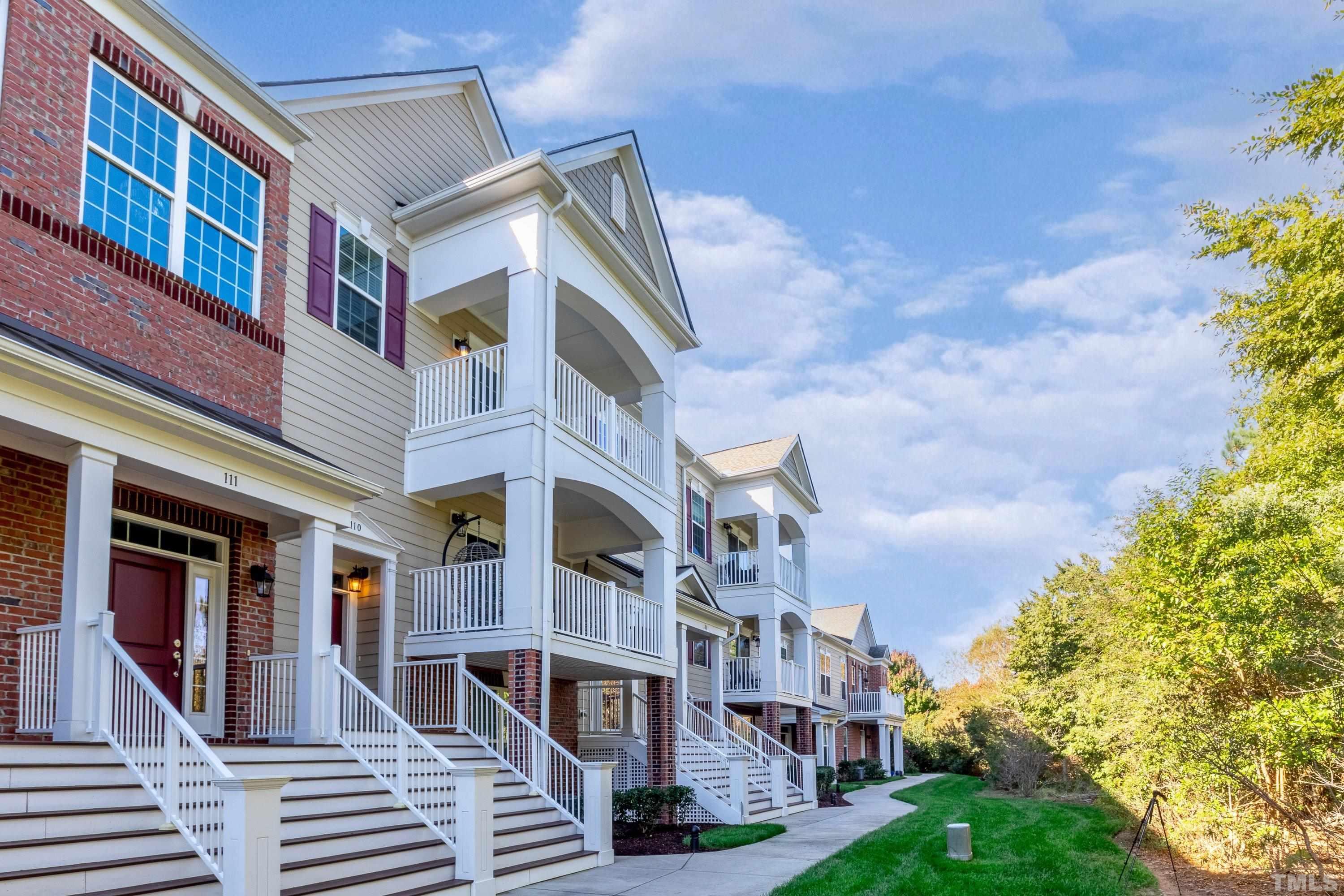 10330 Sablewood Drive, Unit 110 Raleigh, NC 27617 - Photo 49 of 58 a view of a building with a street