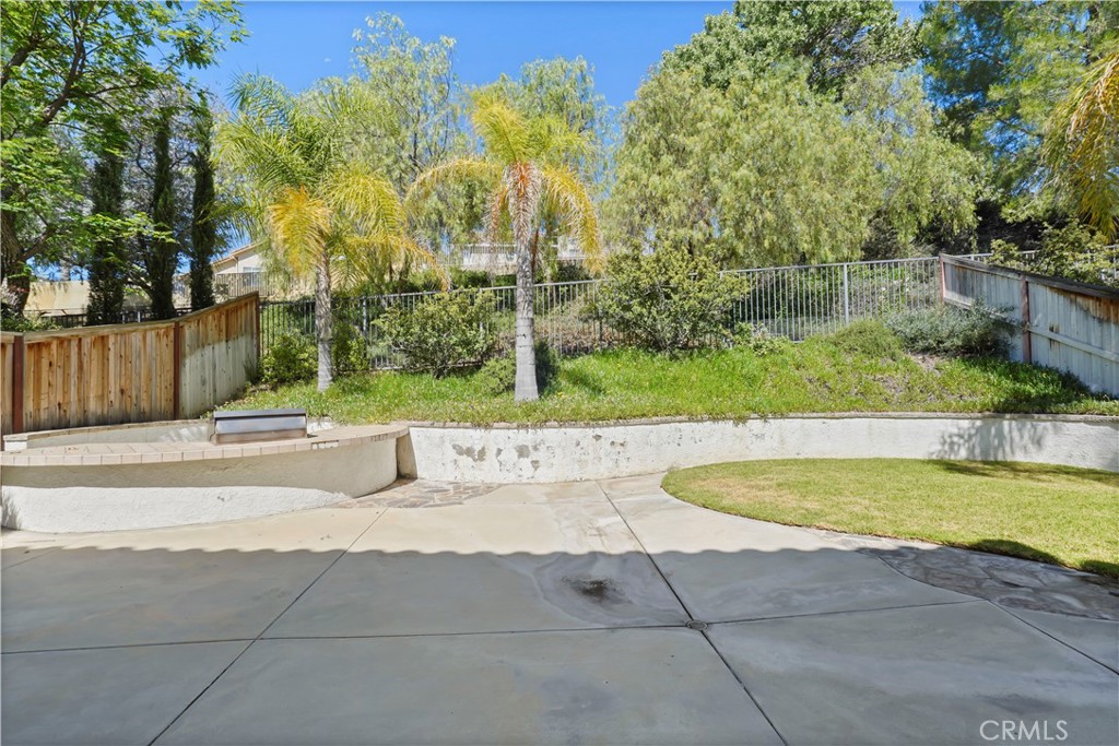 28445 Silverking Trail Saugus, CA 91390 - Photo 44 of 54 a view of a swimming pool with a yard