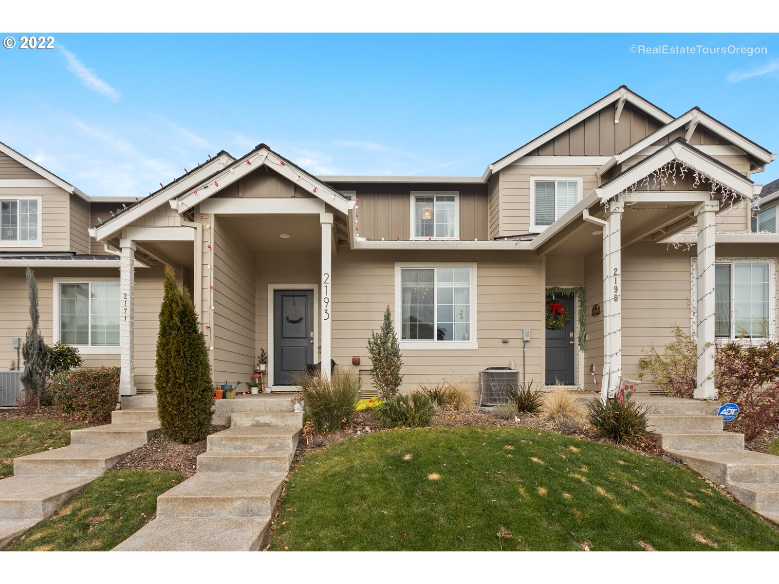 2193 Southeast 16th Street Gresham, OR 97080 - Photo 2 of 32 a front view of a house with a yard