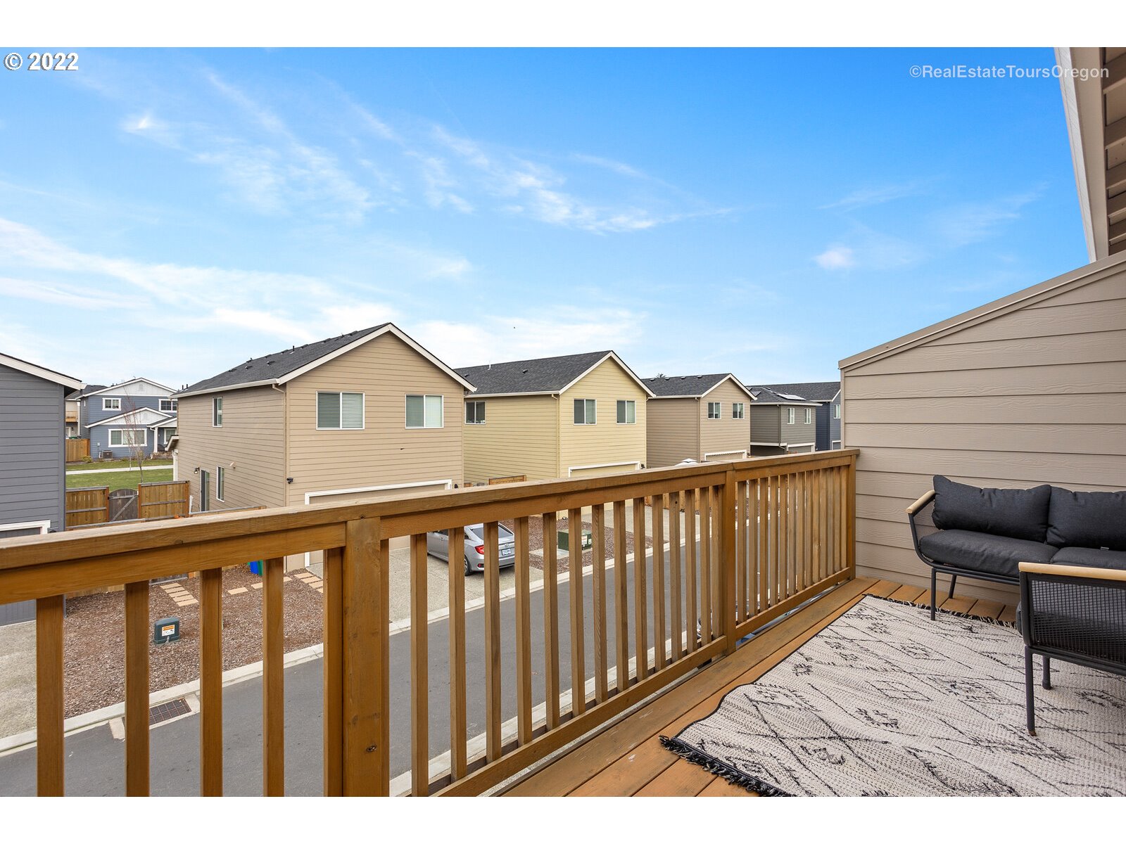 2193 Southeast 16th Street Gresham, OR 97080 - Photo 23 of 32 a view of a wooden chairs on the roof deck