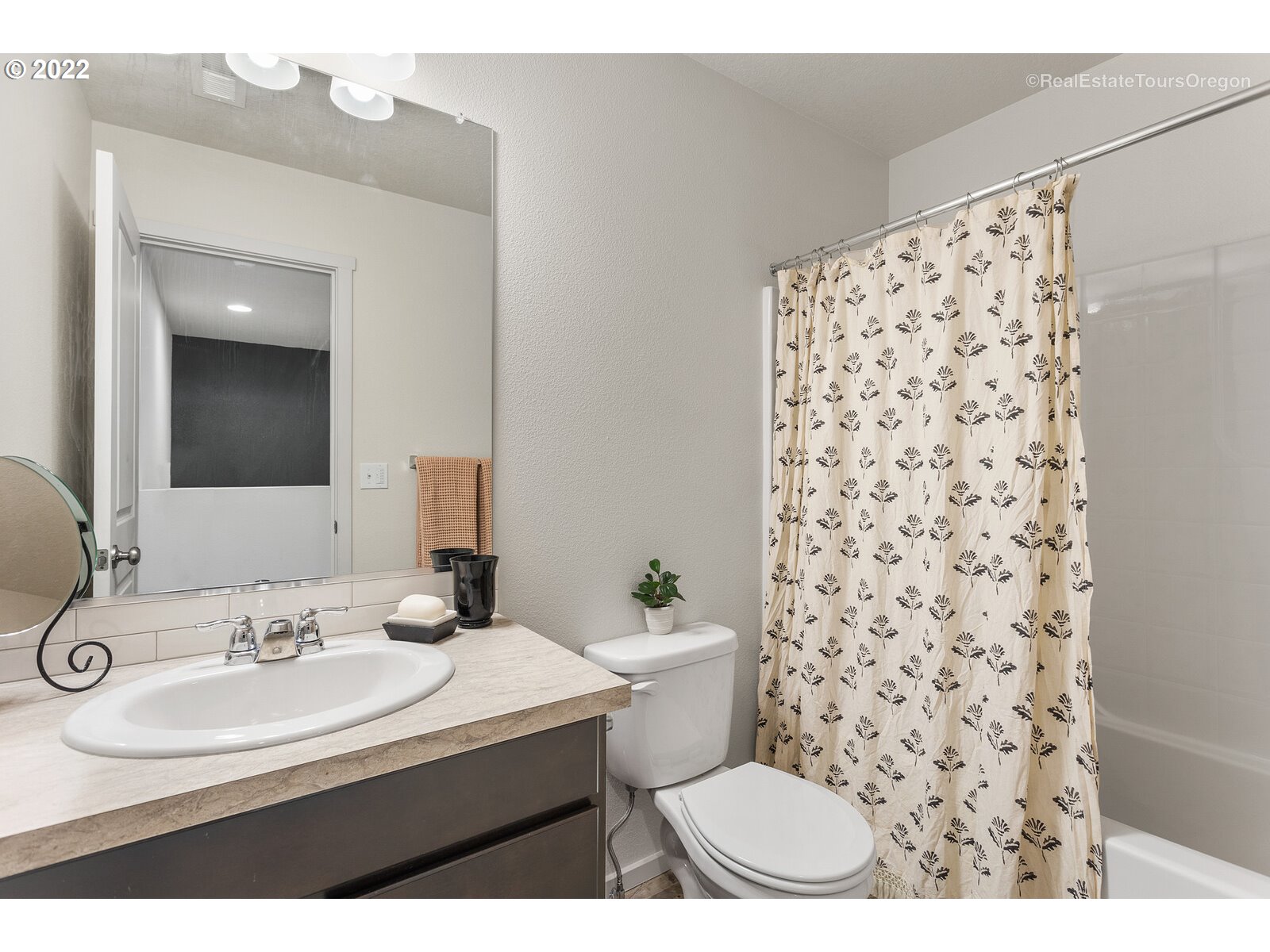 2193 Southeast 16th Street Gresham, OR 97080 - Photo 29 of 32 a bathroom with a sink toilet and shower