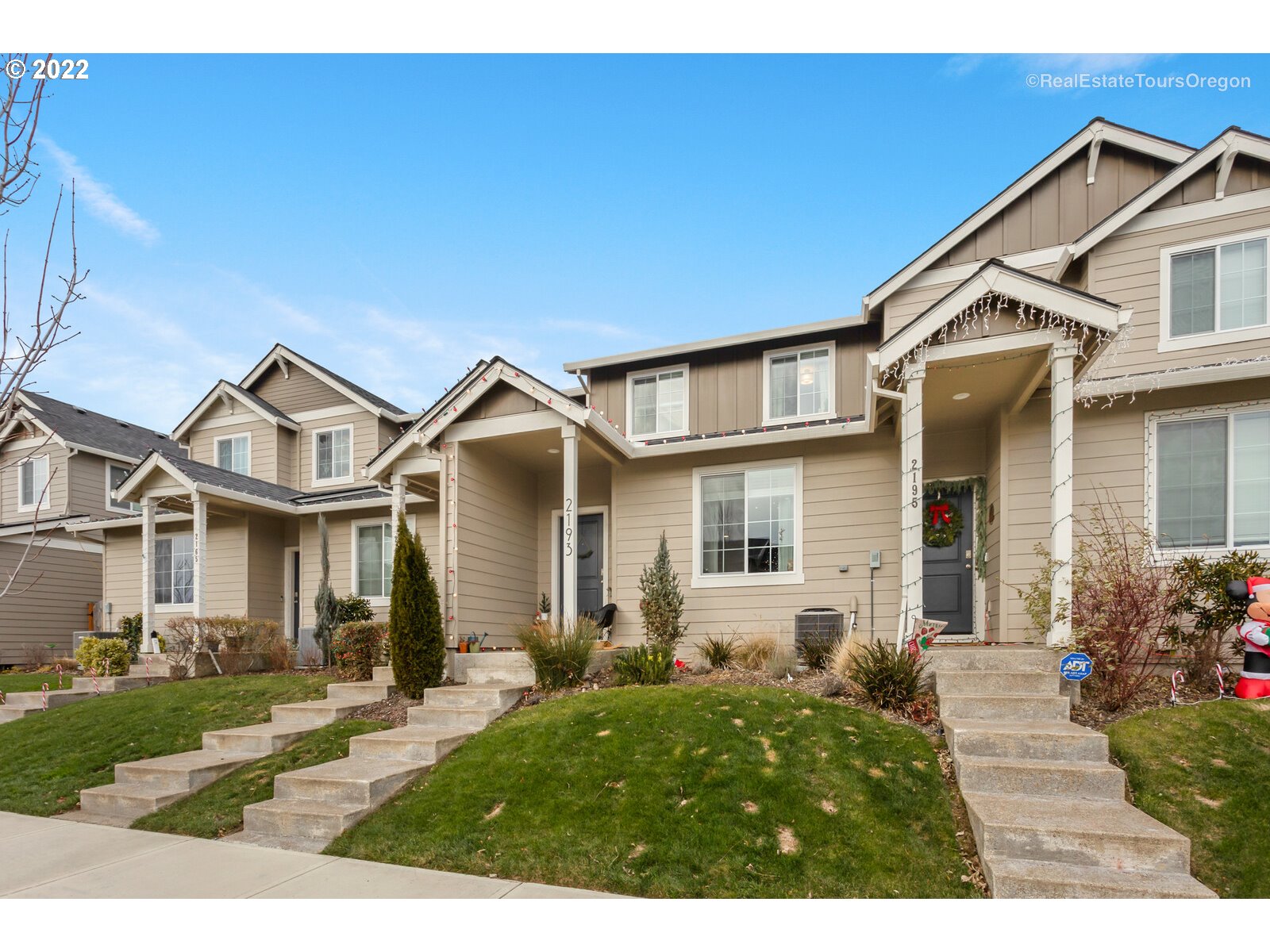 2193 Southeast 16th Street Gresham, OR 97080 - Photo 3 of 32 a front view of a house with a yard