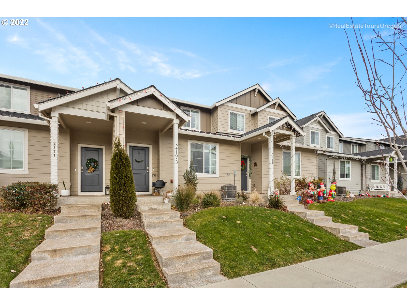 2193 Southeast 16th Street Gresham, OR 97080 - Photo 4 of 32 a front view of a house with a yard