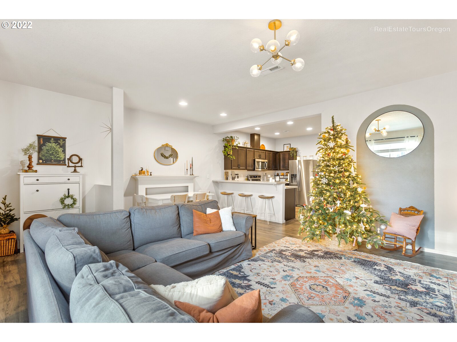 2193 Southeast 16th Street Gresham, OR 97080 - Photo 5 of 32 a living room with furniture and a chandelier
