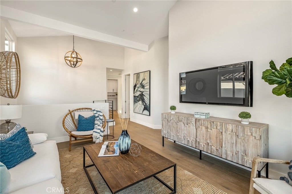 2016 Clark Lane, Unit A Redondo Beach, CA 90278 - Photo 16 of 30 a living room with furniture and a window