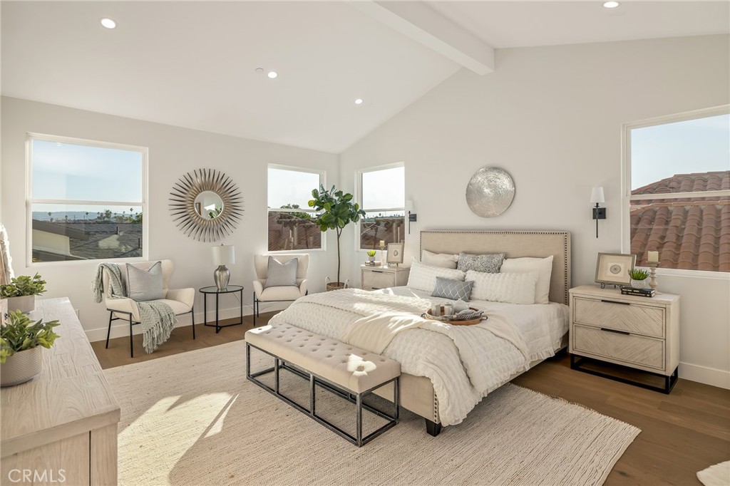 2016 Clark Lane, Unit A Redondo Beach, CA 90278 - Photo 17 of 30 a bedroom with bed and windows