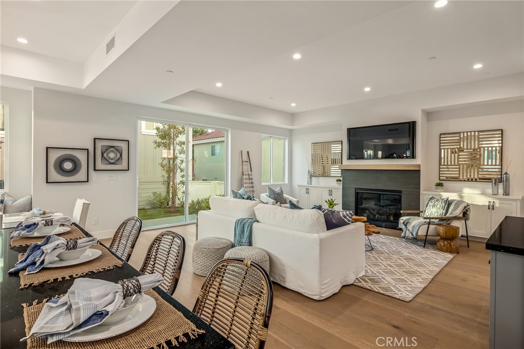 2016 Clark Lane, Unit A Redondo Beach, CA 90278 - Photo 5 of 30 a living room with furniture fireplace and window