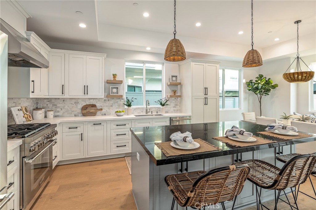 2016 Clark Lane, Unit A Redondo Beach, CA 90278 - Photo 6 of 30 a kitchen with a table and chairs in it