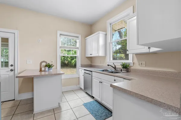 a view of a bathroom with a glass door