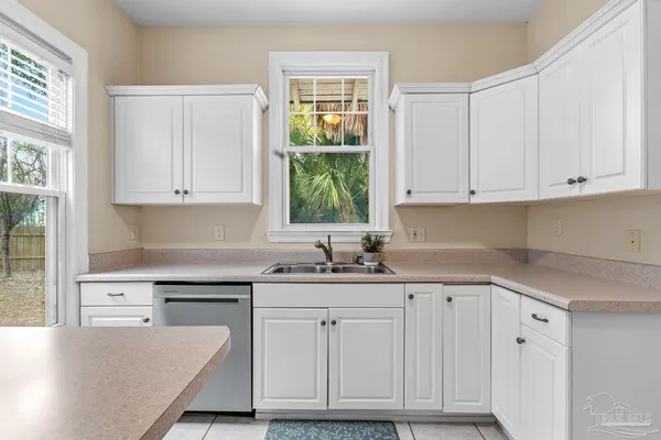 a bathroom with a sink a vanity and a mirror