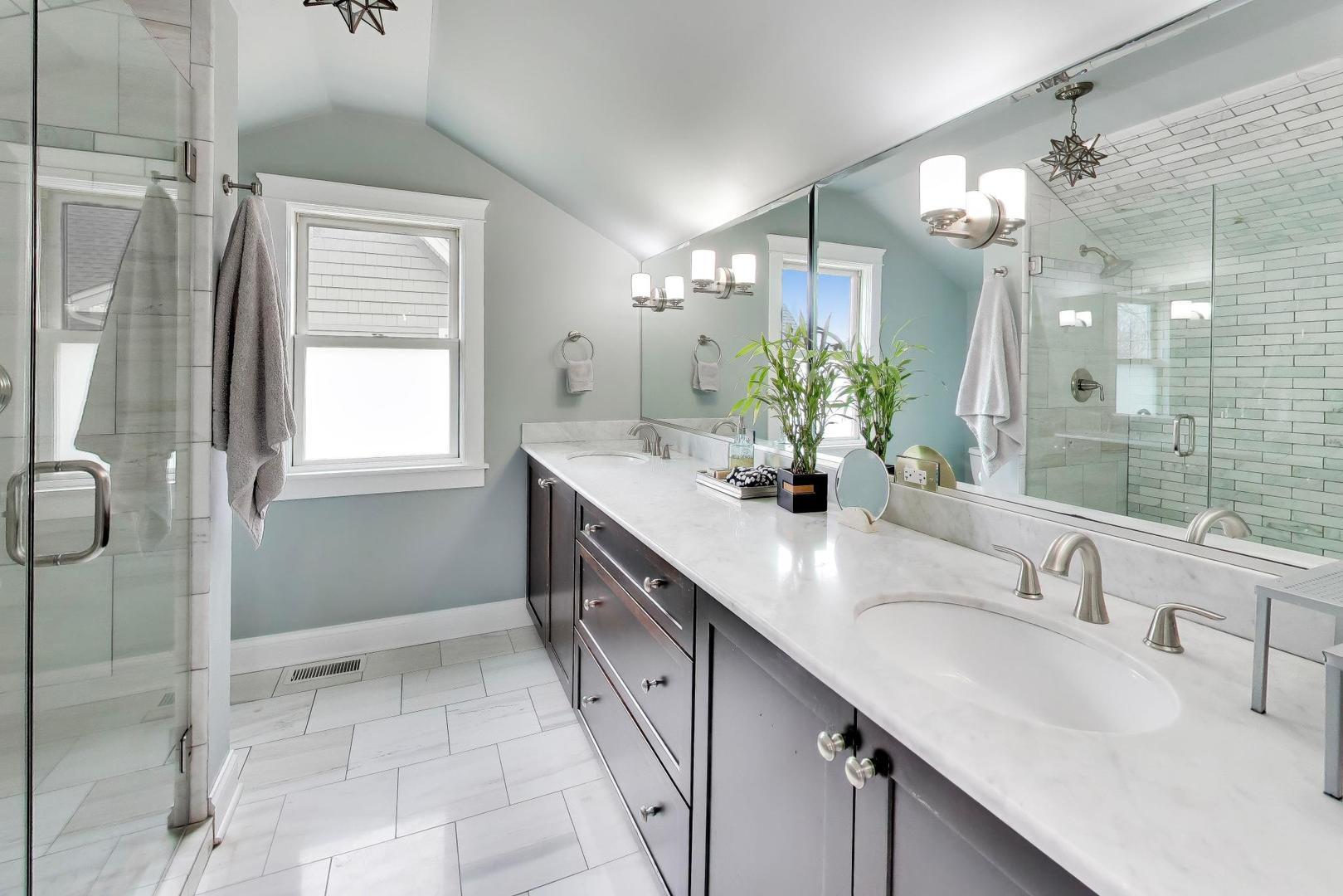 274 Oak Street Elmhurst, IL 60126 - Photo 14 of 31 a bathroom with a double vanity sink mirror and shower