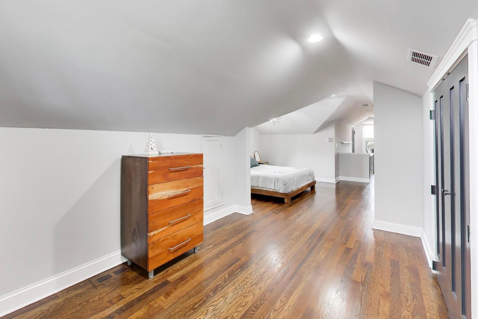 274 Oak Street Elmhurst, IL 60126 - Photo 17 of 31 a living room with furniture and a wooden floor