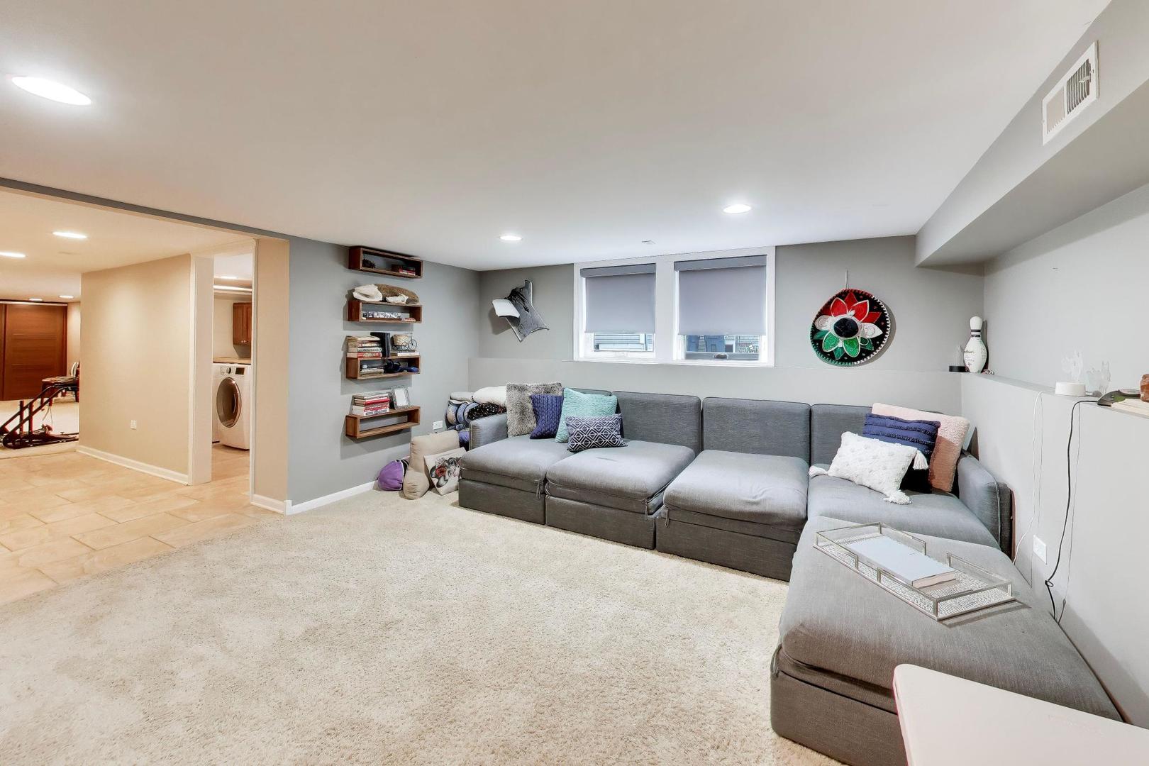 274 Oak Street Elmhurst, IL 60126 - Photo 23 of 31 a living room with furniture and a white couch