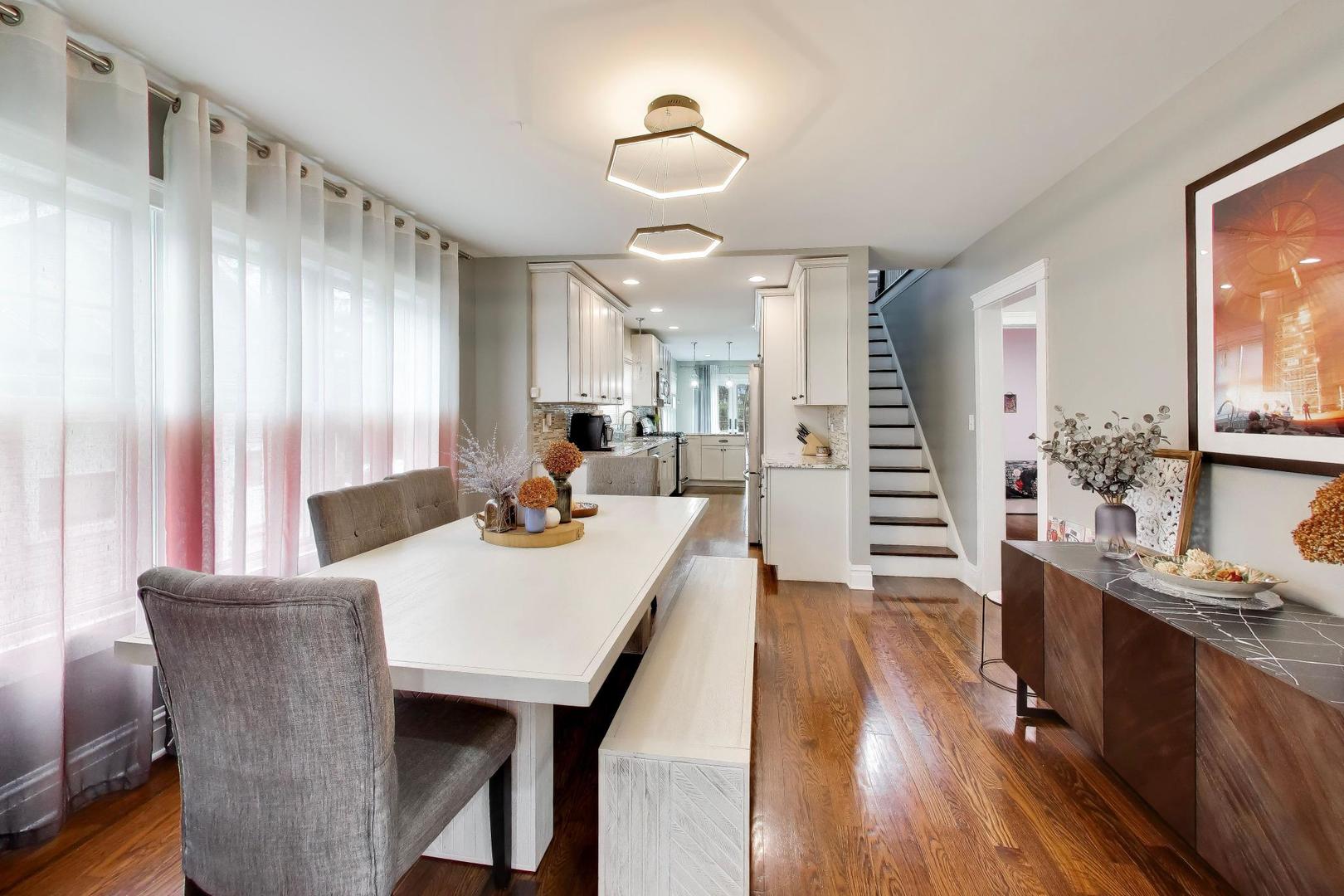 274 Oak Street Elmhurst, IL 60126 - Photo 4 of 31 a view of a a dining room with furniture window and wooden floor