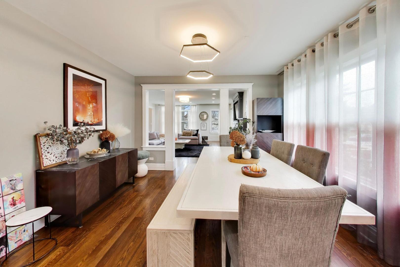274 Oak Street Elmhurst, IL 60126 - Photo 5 of 31 a view of a dining room with furniture window and wooden floor