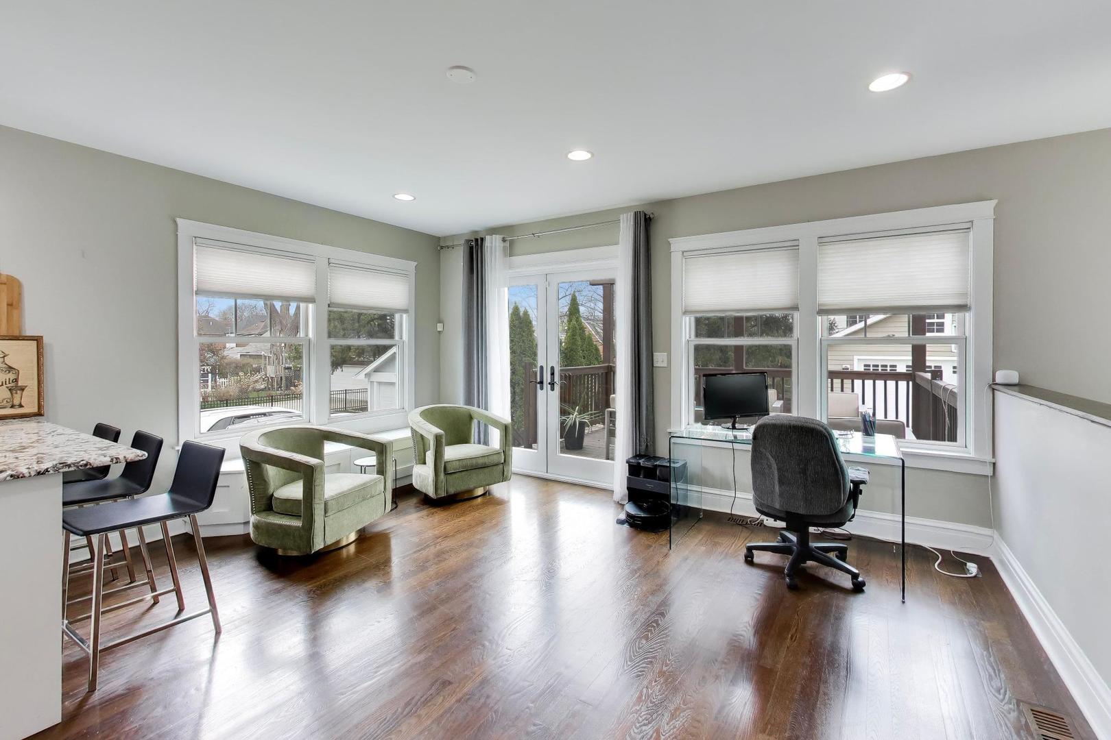 274 Oak Street Elmhurst, IL 60126 - Photo 8 of 31 a living room with furniture and a large window