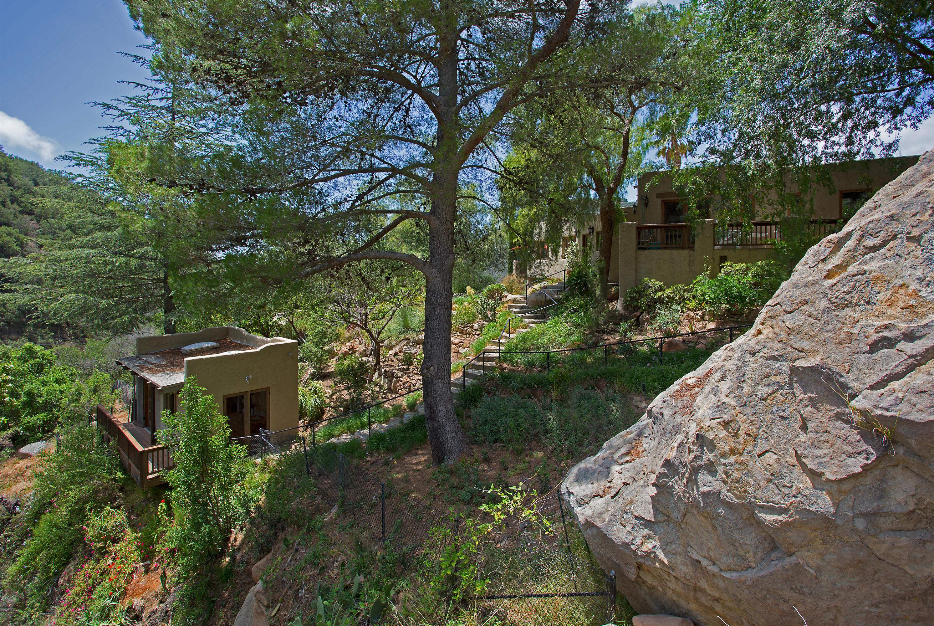 1090 Toro Canyon Road Santa Barbara, CA 93108 - Photo 17 of 28 a backyard of a house with lots of green space