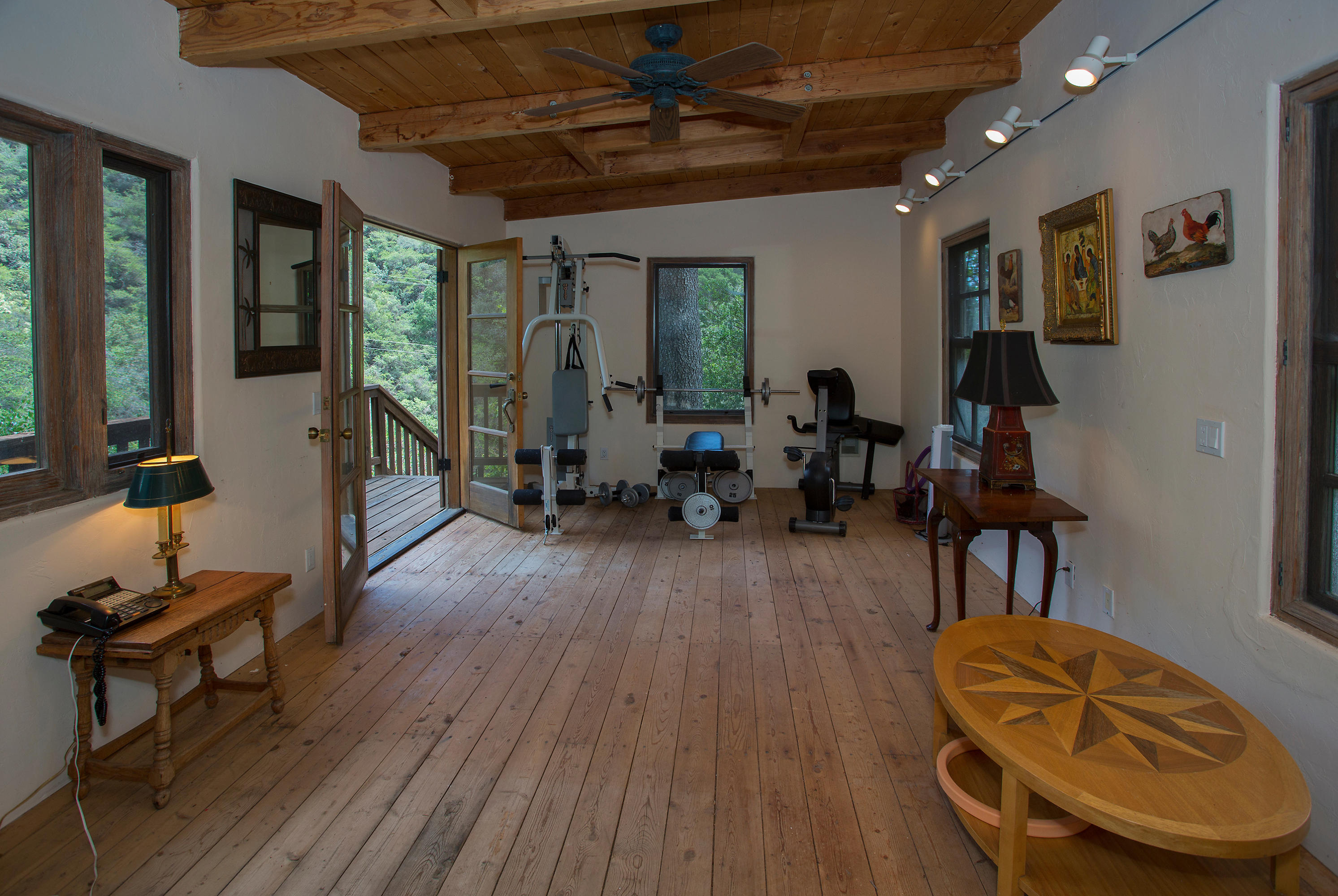 1090 Toro Canyon Road Santa Barbara, CA 93108 - Photo 18 of 28 a living room with furniture and a wooden floor