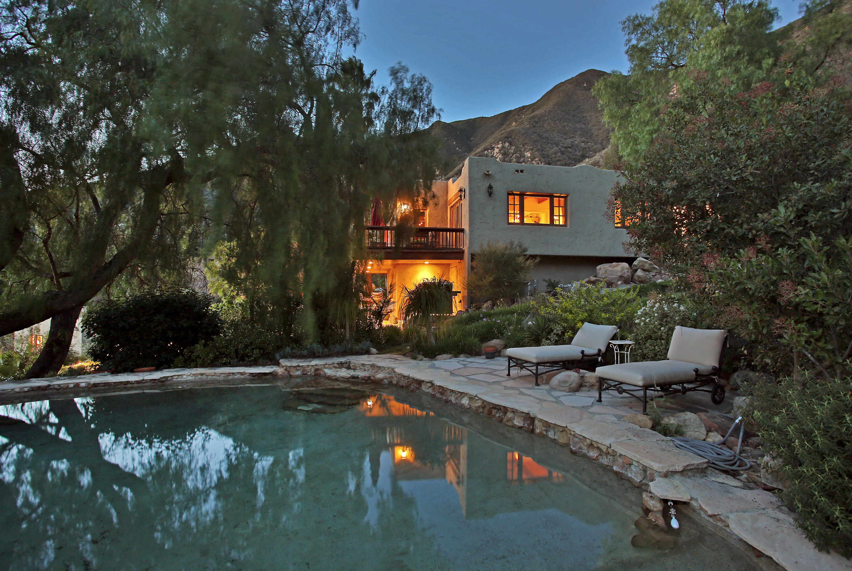 1090 Toro Canyon Road Santa Barbara, CA 93108 - Photo 2 of 28 a view of swimming pool with outdoor seating and plants