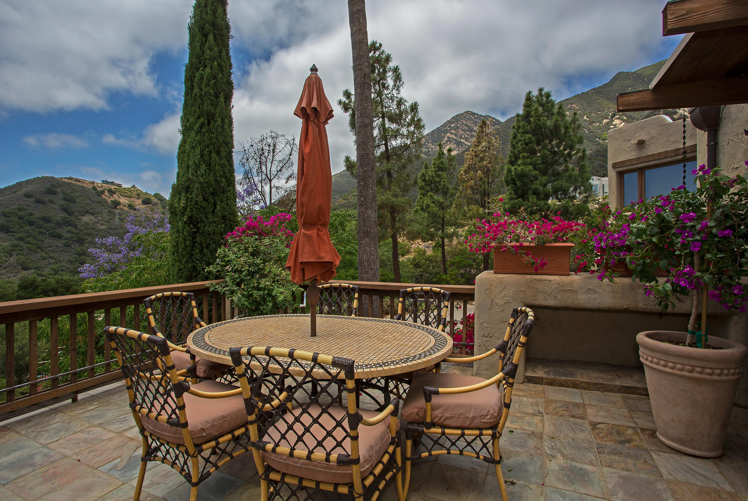 1090 Toro Canyon Road Santa Barbara, CA 93108 - Photo 23 of 28 a view of a table and chairs in patio