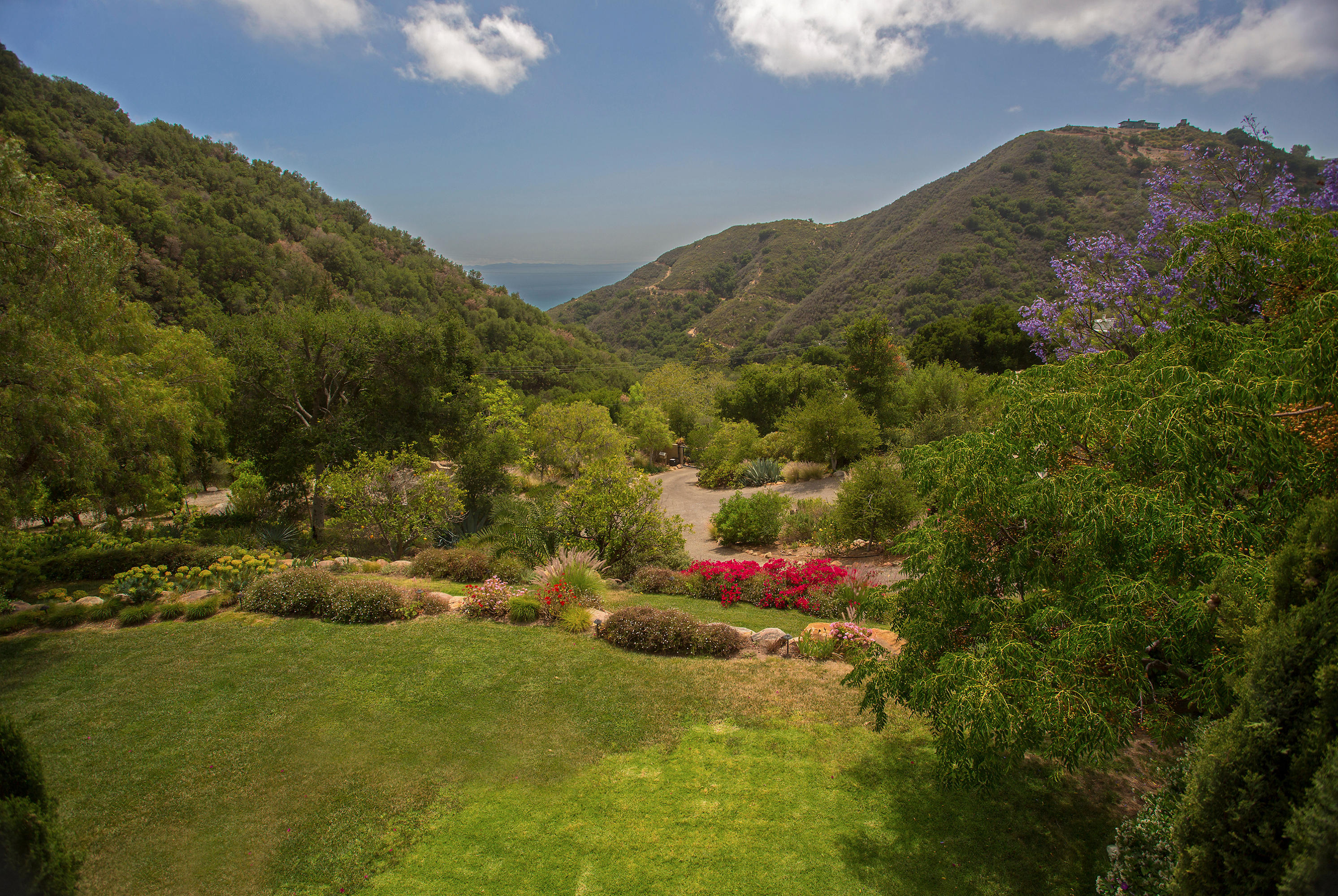 1090 Toro Canyon Road Santa Barbara, CA 93108 - Photo 25 of 28 a view of a houses with a yard