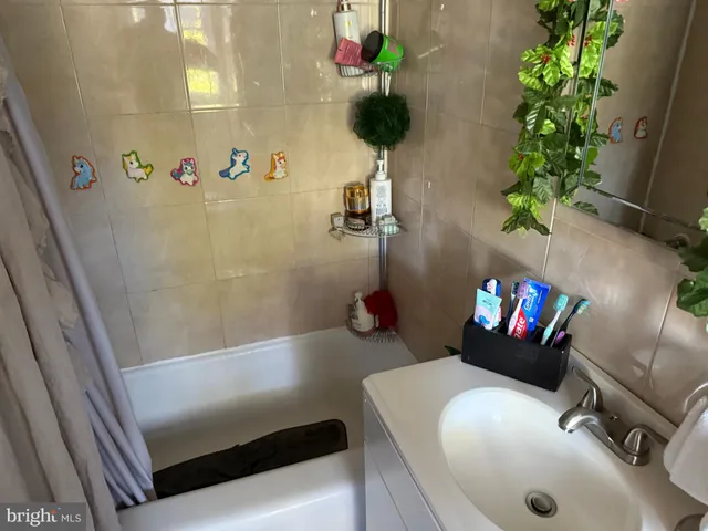 a bathroom with a toilet and a sink