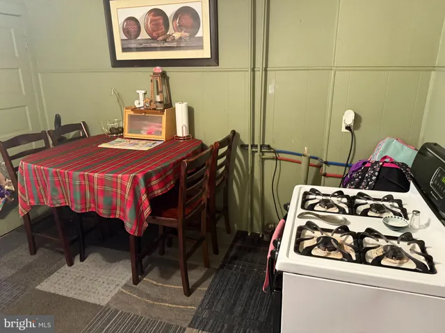 a bedroom with a bed and a table in it