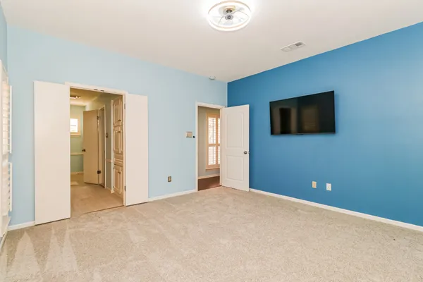 a view of a livingroom with a flat screen tv