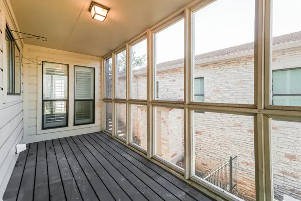 a view of wooden floor in a balcony