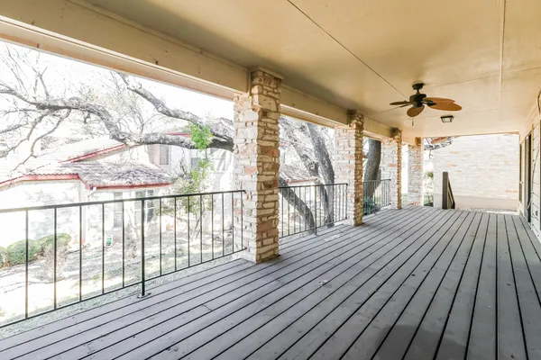 a view of hallway with wooden floor