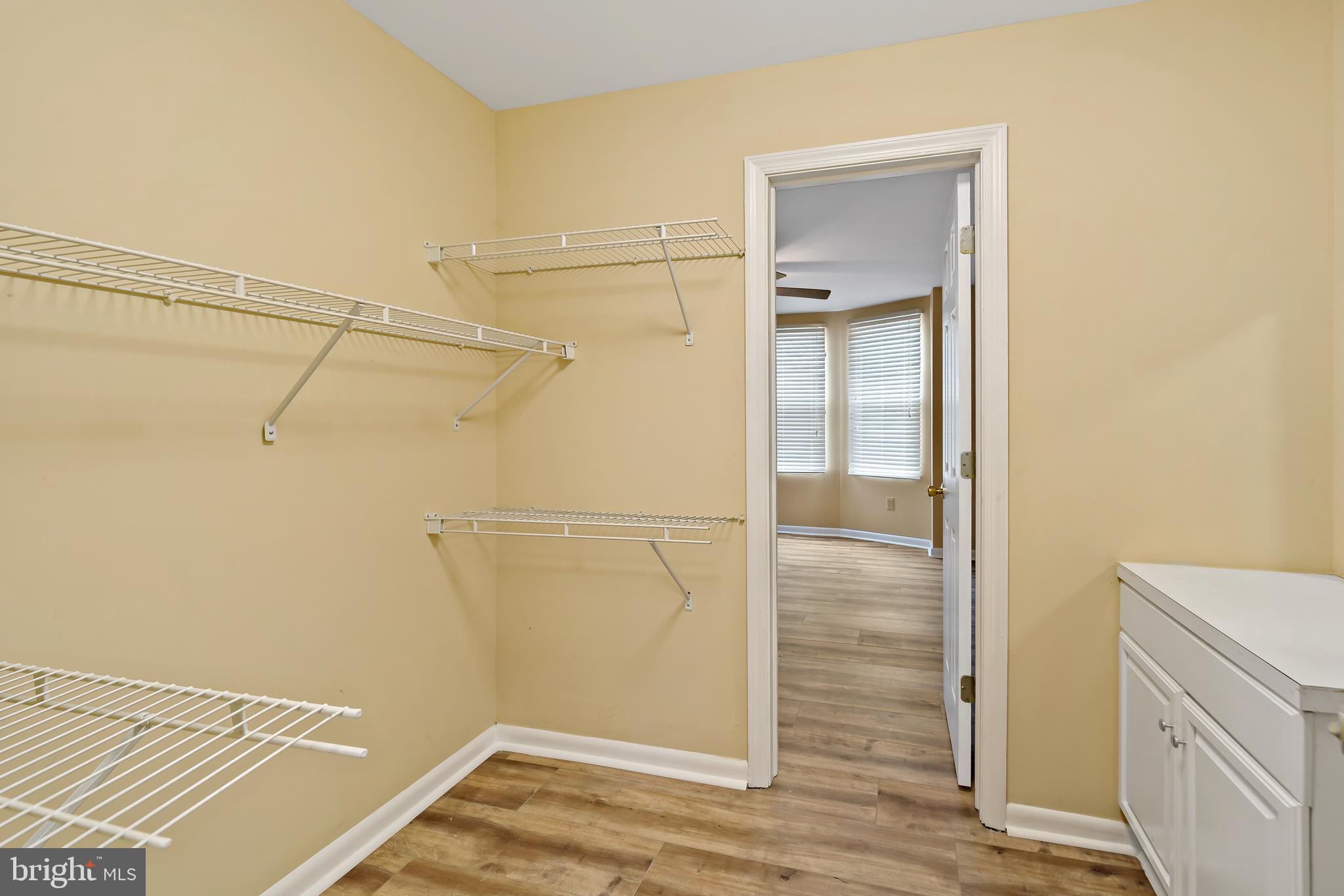 2537 South Broad Street, Unit 2 Philadelphia, PA 19148 - Photo 13 of 18 a view of walk in closet with empty racks