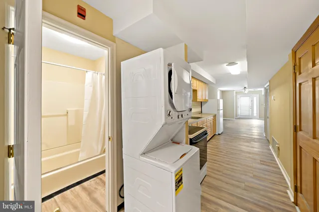 a view of a kitchen with storage and utility