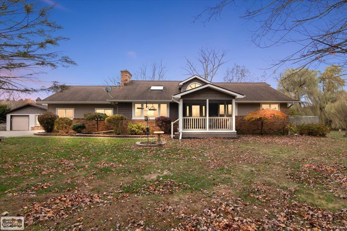 9800 Coon Hill Road Munith, MI 49259 - Photo 1 of 78