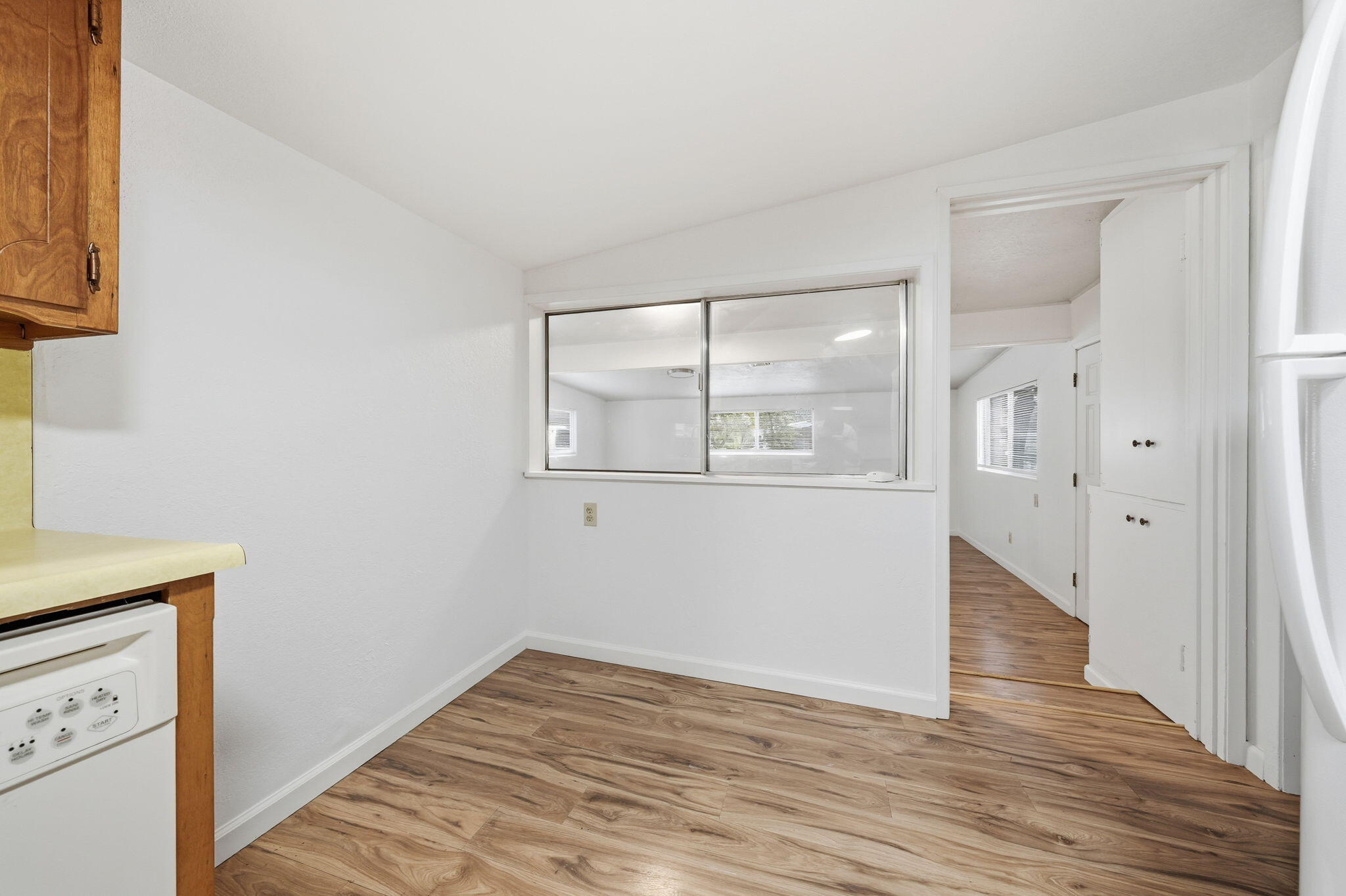 1717 Deer Creek Road Shasta Lake, CA 96019 - Photo 13 of 54 a view of empty room with wooden floor and fan