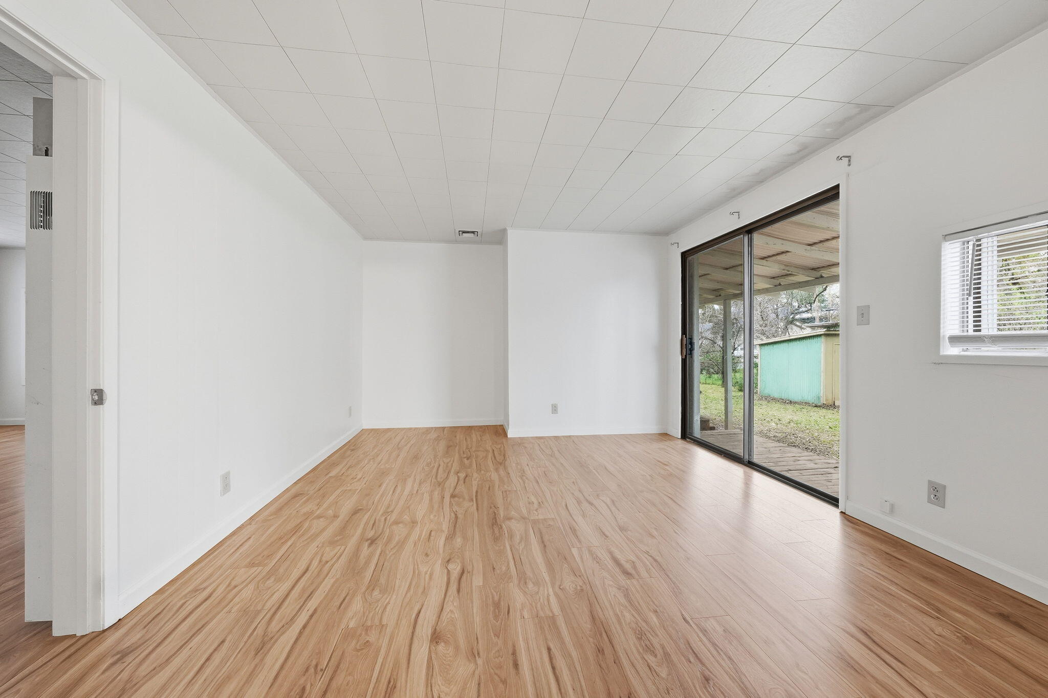 1717 Deer Creek Road Shasta Lake, CA 96019 - Photo 15 of 54 a view of an empty room and glass door