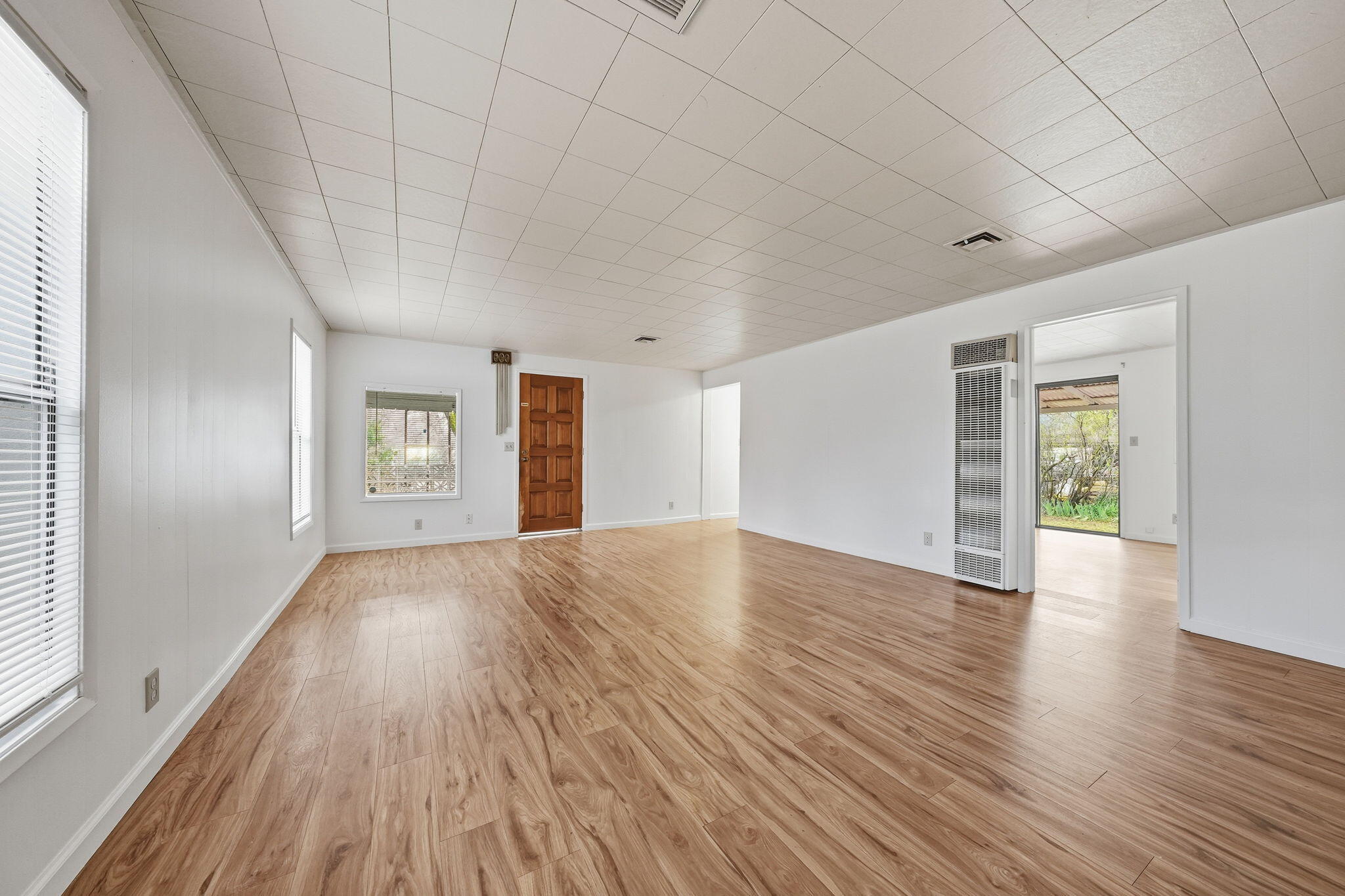 1717 Deer Creek Road Shasta Lake, CA 96019 - Photo 20 of 54 a view of empty room with wooden floor and fan