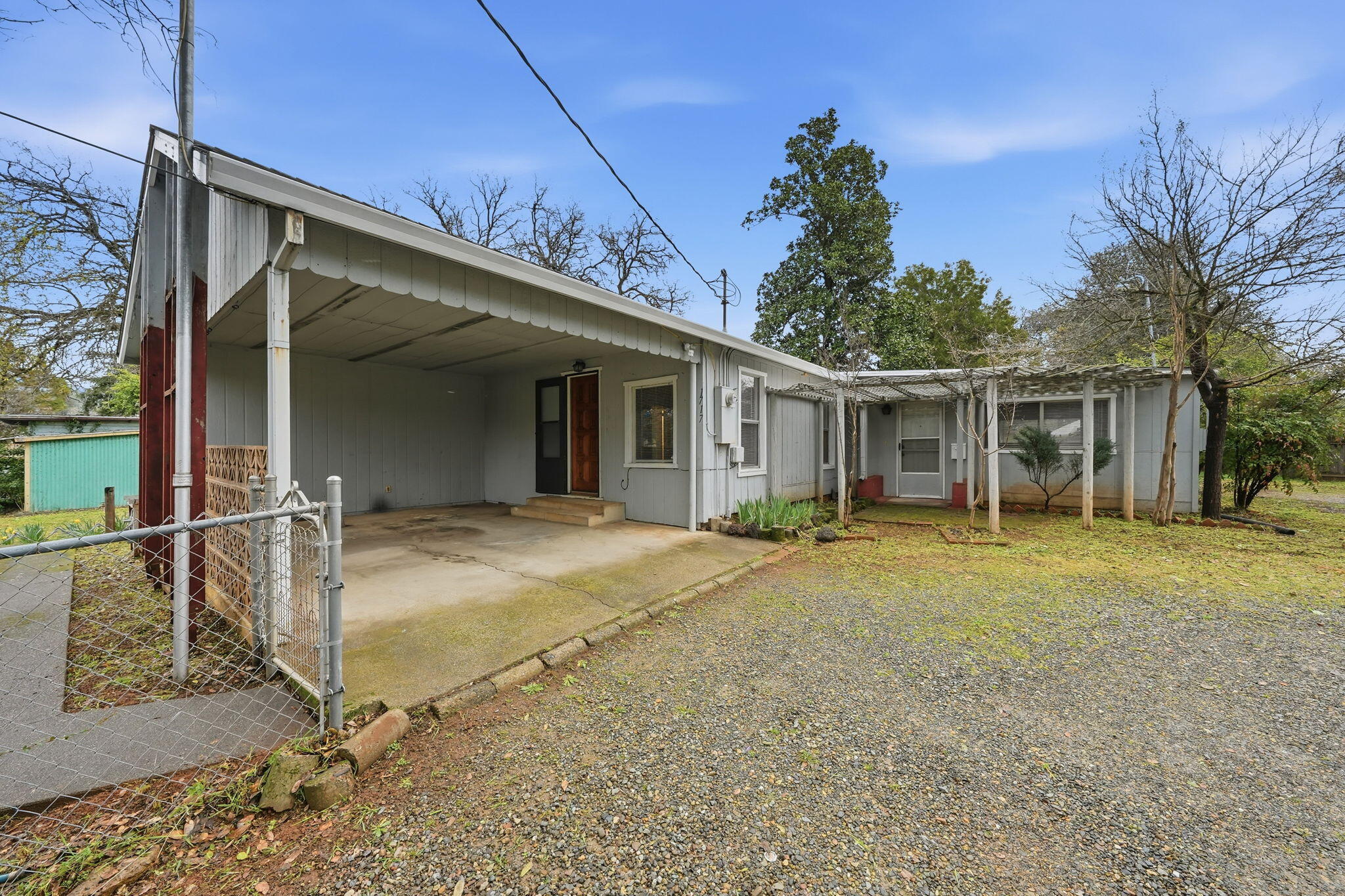 1717 Deer Creek Road Shasta Lake, CA 96019 - Photo 2 of 54 front view of a house with a dry yard