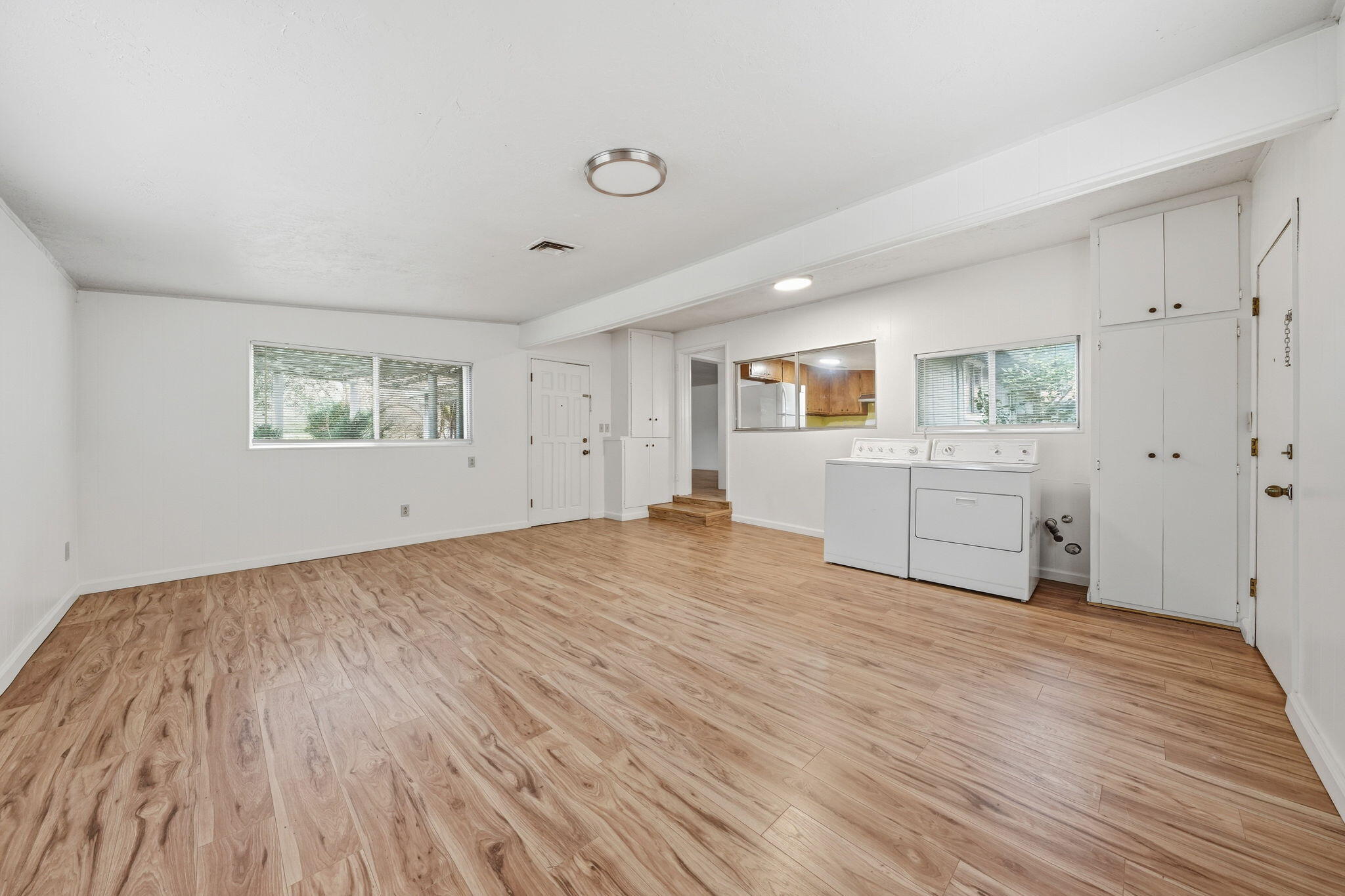 1717 Deer Creek Road Shasta Lake, CA 96019 - Photo 25 of 54 a view of empty room with wooden floor and fan