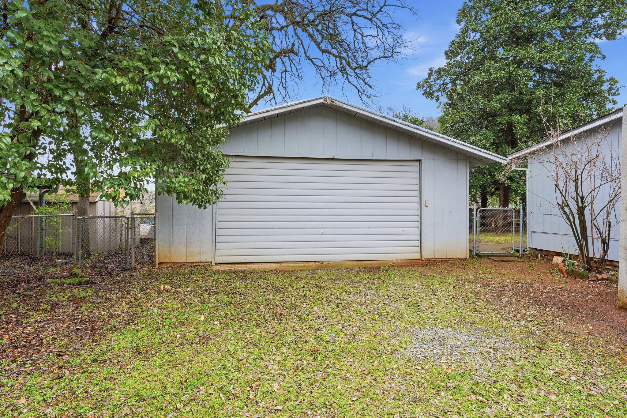 1717 Deer Creek Road Shasta Lake, CA 96019 - Photo 39 of 54 a house with a yard