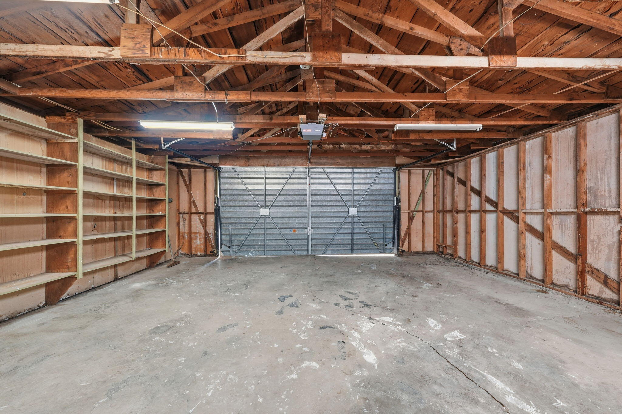 1717 Deer Creek Road Shasta Lake, CA 96019 - Photo 42 of 54 a view of an empty room with wooden walls