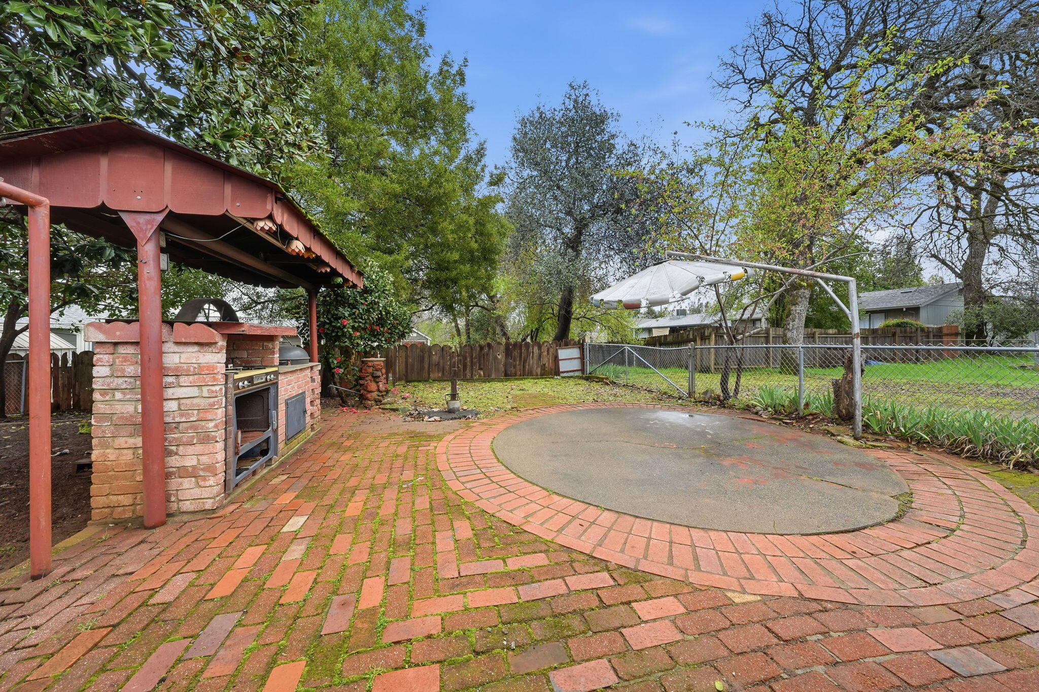1717 Deer Creek Road Shasta Lake, CA 96019 - Photo 44 of 54 a view of a swimming pool with a patio