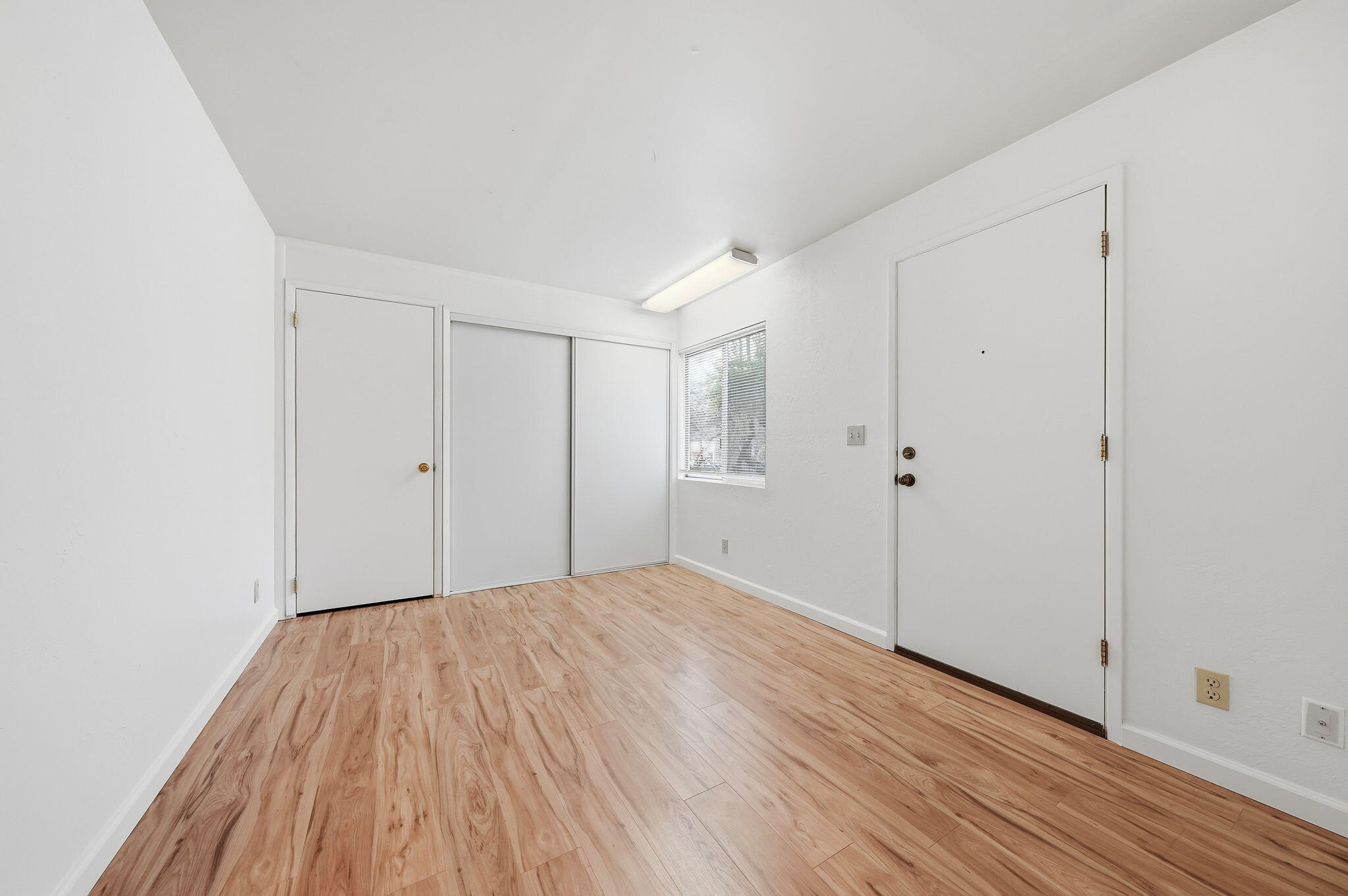 1717 Deer Creek Road Shasta Lake, CA 96019 - Photo 10 of 54 a view of empty room with wooden floor